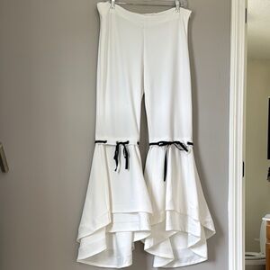 White and Black Flare Pants with Dramatic Ruffle Detail
